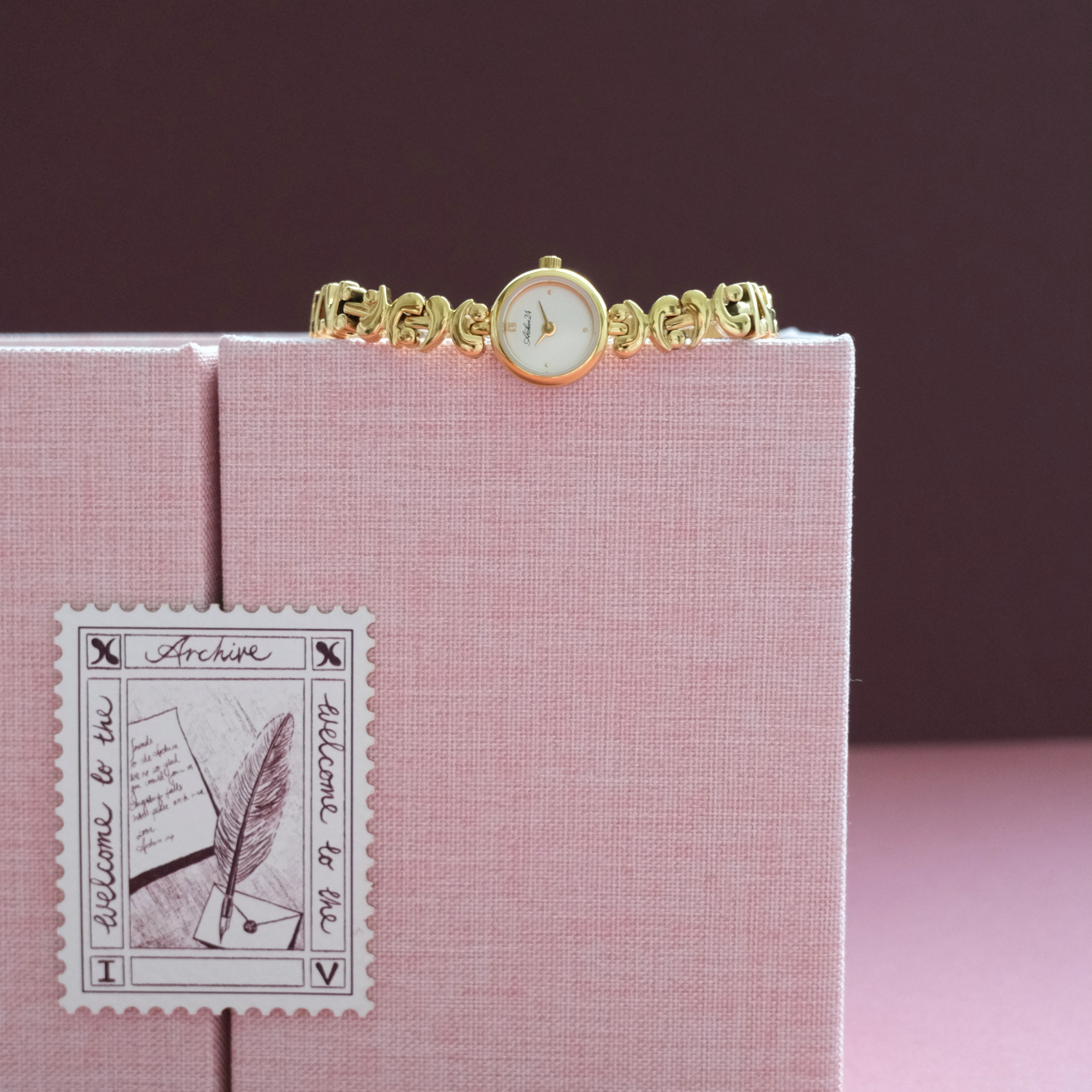 Archive24's gold XXIV jewelry watch with packaging